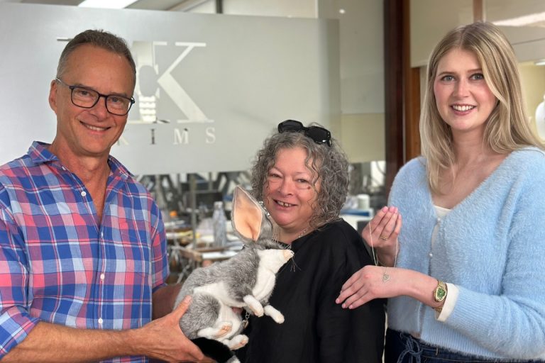 Craig, Sara and Beck, with a plush bilby and the Pawprint Pendant for Bilby conservation. Taken at McKims Jewellers